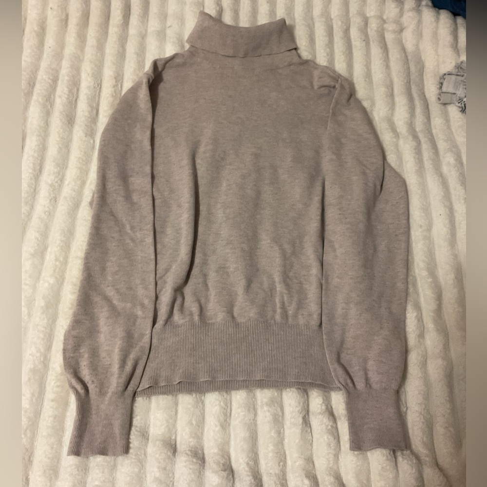 Cute beige turtle neck.